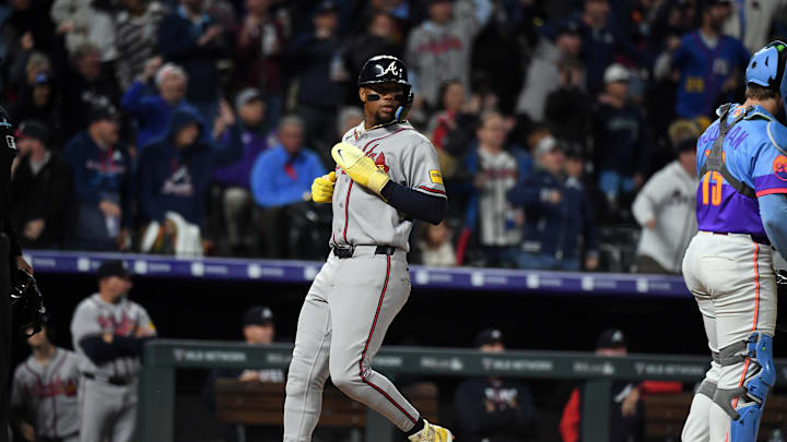 May 1, 2026; Denver, Colorado, USA; Atlanta Braves outfielder Ronald Acuna Jr. (13) scores during the eighth inning against the Colorado Rockies at Coors Field. Mandatory Credit: Christopher Hanewinckel-Imagn Images