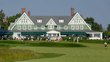 The Oakmont Country Club clubhouse sits in the distance near the No. 9 green and practice area during the 125th U.S. Open practice round on June 11, 2025 at Oakmont Country Club in Oakmont, Pa.