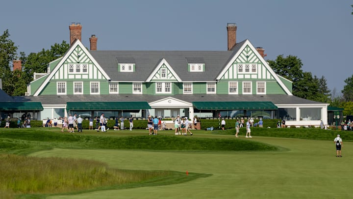 The Oakmont Country Club clubhouse sits in the distance near the No. 9 green and practice area during the 125th U.S. Open practice round on June 11, 2025 at Oakmont Country Club in Oakmont, Pa.