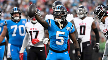 Oct 13, 2024; Charlotte, North Carolina, USA; Carolina Panthers wide receiver Diontae Johnson (5) reacts after making a catch in the second quarter at Bank of America Stadium. Mandatory Credit: Bob Donnan-Imagn Images