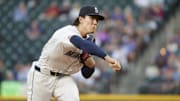 Sep 8, 2025; Seattle, Washington, USA; Seattle Mariners starting pitcher Bryan Woo (22) throws against the St. Louis Cardinals during the second inning at T-Mobile Park. Mandatory Credit: Joe Nicholson-Imagn Images