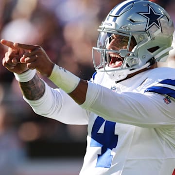 Sep 8, 2024; Cleveland, Ohio, USA; Dallas Cowboys quarterback Dak Prescott (4) celebrates after a touchdown during the first half against the Cleveland Browns at Huntington Bank Field. 