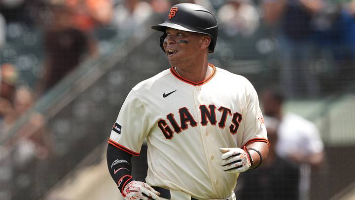 Jul 12, 2026; San Francisco, California, USA; San Francisco Giants first baseman Rafael Devers (16) reacts after scoring a run against the Colorado Rockies during the eighth inning at Oracle Park. Mandatory Credit: Darren Yamashita-Imagn Images