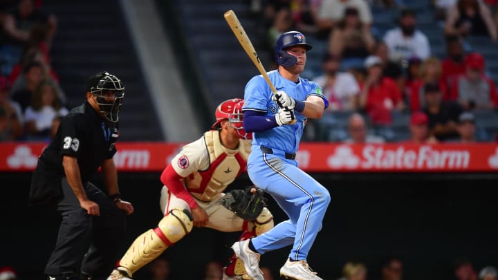 Aug 12, 2024; Anaheim, California, USA; Toronto Blue Jays second baseman Will Wagner (7) hits a single against the Los Angeles Angels during the fifth inning at Angel Stadium.