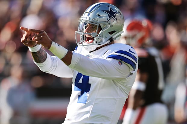 Dallas Cowboys quarterback Dak Prescott celebrates after a touchdown during the first half against the Cleveland Browns. Dak Prescott ripped as 'unreliable, not cut out to lead' Cowboys by NFL insider - bb