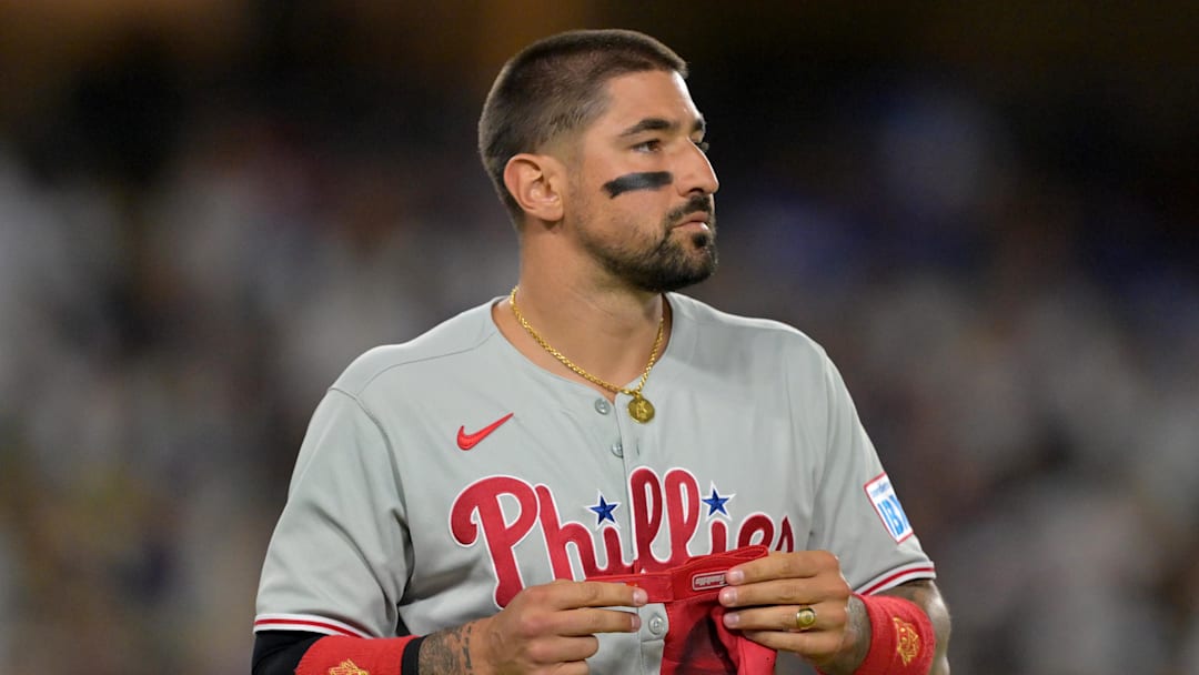 Philadelphia Phillies right fielder Nick Castellanos (8) returns to the dugout after an out against the Los Angeles Dodgers at Dodger Stadium. 