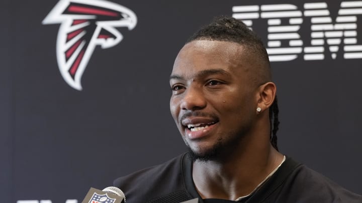 Jun 3, 2024; Atlanta, GA, USA; Atlanta Falcons running back Bijan Robinson (7) is interviewed after OTA at the Falcons Training facility. Mandatory Credit: Dale Zanine-USA TODAY Sports