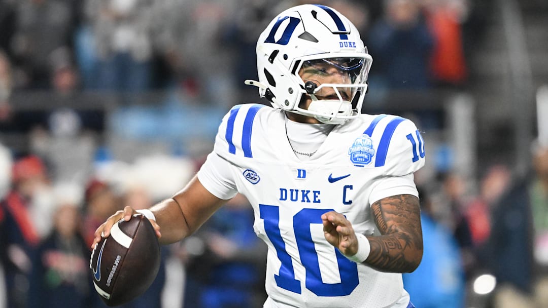 Dec 6, 2025; Charlotte, NC, USA; Duke Blue Devils quarterback Darian Mensah (10) looks to throw in the second quarter against the Virginia Cavaliers during the 2025 ACC Championship game at Bank of America Stadium. Mandatory Credit: Bob Donnan-Imagn Images
