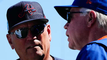 Mar 2, 2023; Port St. Lucie, Florida, USA; Atlanta Braves manger Brian Snitker talks to New York Mets manager Buck Showalter prior to a game between the New York Mets and the Atlanta Braves at Clover Park. Mandatory Credit: Rich Storry-Imagn Images