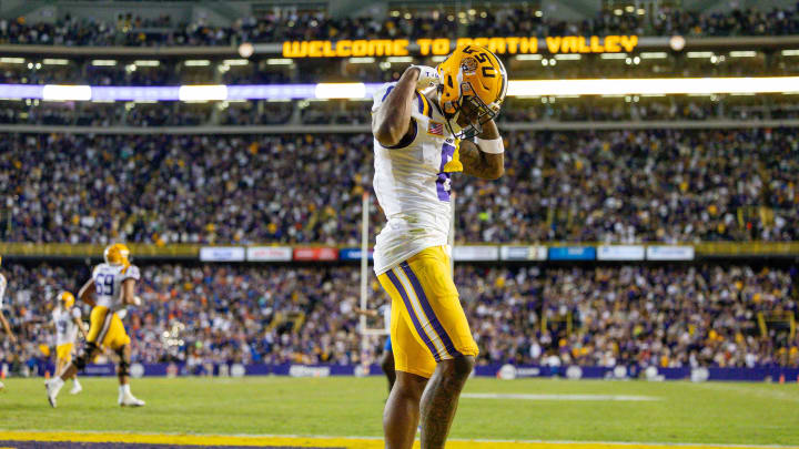 Nov 11, 2023; Baton Rouge, Louisiana, USA;  LSU Tigers wide receiver Malik Nabers (8) reacts after a play against the Florida Gators during the second half at Tiger Stadium. Mandatory Credit: Stephen Lew-USA TODAY Sports