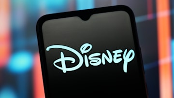 In this photo illustration, the Disney logo is seen...