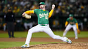 Sep 21, 2024; Oakland, California, USA; Oakland Athletics pitcher Hogan Harris (63) delivers a pitch against the New York Yankees in the eighth inning at the Oakland-Alameda County Coliseum. Mandatory Credit: Cary Edmondson-Imagn Images