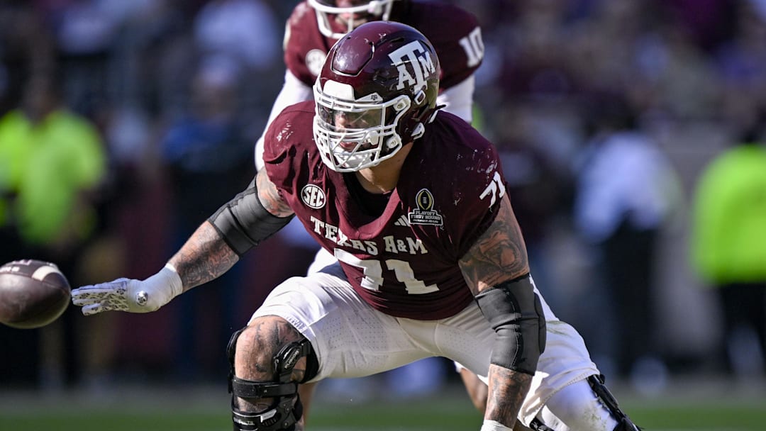 Dec 20, 2025; College Station, TX, USA; Texas A&M Aggies offensive lineman Chase Bisontis (71) blocks the rush during the game between the Aggies and the Hurricanes at Kyle Field. Mandatory Credit: Jerome Miron-Imagn Images