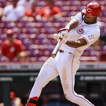 Aug 30, 2024; Cincinnati, Ohio, USA; Cincinnati Reds outfielder Will Benson (30) bats against the Milwaukee Brewers in the ninth inning at Great American Ball Park. Mandatory Credit: Katie Stratman-Imagn Images