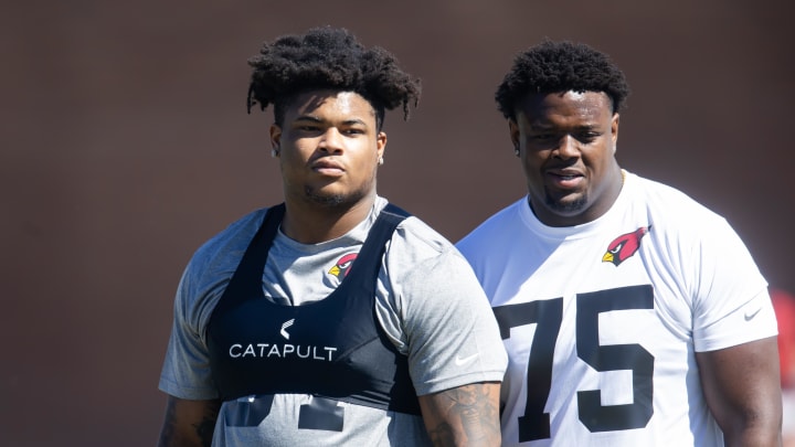 May 10, 2024; Tempe, AZ, USA; Arizona Cardinals offensive lineman Myles Murphy (57) and Christian Jones (75) during rookie minicamp at the teams Tempe Training Facility. Mandatory Credit: Mark J. Rebilas-USA TODAY Sports