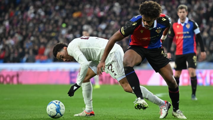 Renato Veiga (right) tussles with Bayern Munich's Jamal Musiala