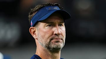 Dallas Cowboys head coach Brian Schottenheimer takes a break