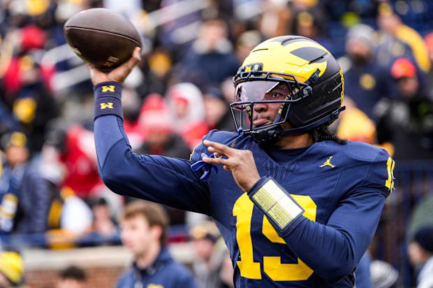 Michigan quarterback Bryce Underwood warms up.