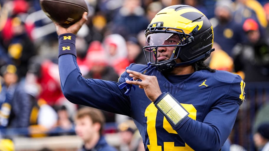 Michigan quarterback Bryce Underwood warms up.
