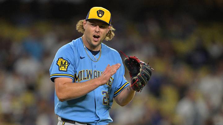 Aug 13, 2026; Los Angeles, California, USA;  Milwaukee Brewers relief pitcher Trevor Megill (29) reacts after earning a save to defeat the Los Angeles Dodgers in the ninth inning at Dodger Stadium. Mandatory Credit: Jayne Kamin-Oncea-Imagn Images