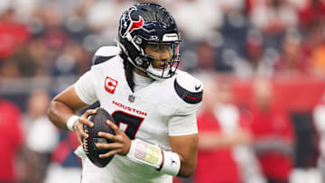 Sep 15, 2025; Houston, Texas, USA;  Houston Texans quarterback C.J. Stroud (7) drops back to pass during the first quarter against the Tampa Bay Buccaneers at NRG Stadium. Mandatory Credit: Troy Taormina-Imagn Images