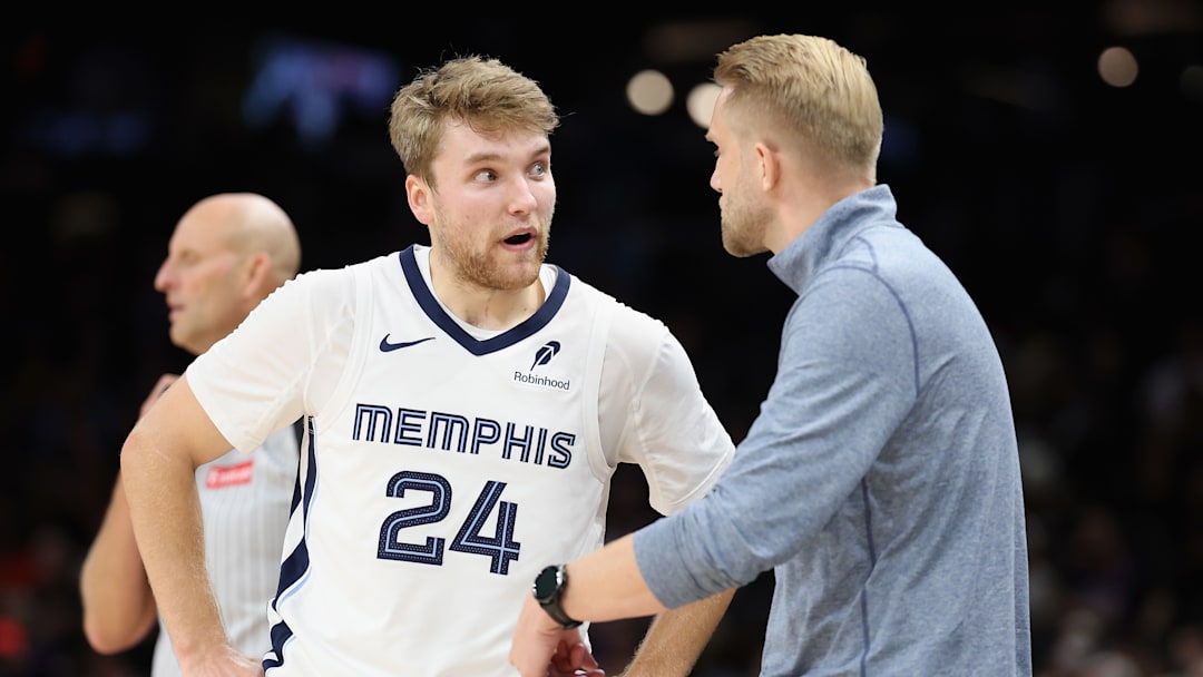 Oct 29, 2025; Phoenix, Arizona, USA; Grizzlies' guard Cam Spencer (24) receiving instructions from head coach Tuomas Iisalo during the Grizzlies' victory against the Phoenix Suns. Oct 29, 2025; Phoenix, Arizona, USA; Grizzlies' guard Cam Spencer (24) receiving instructions from head coach Tuomas Iisalo during the Grizzlies' victory against the Phoenix Suns.