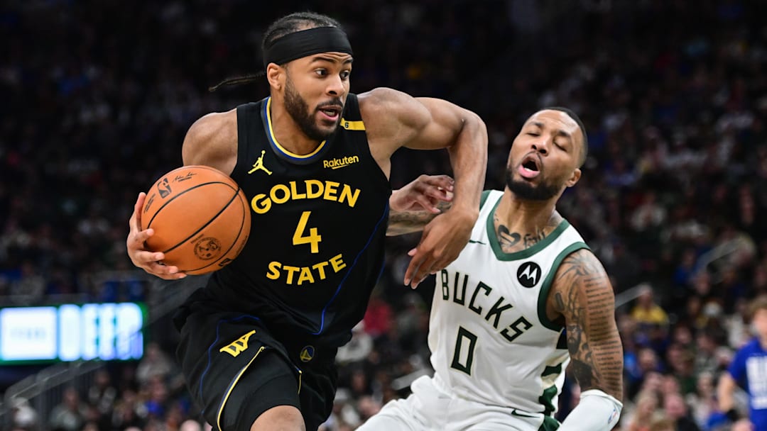 Feb 10, 2025; Milwaukee, Wisconsin, USA; Golden State Warriors forward Moses Moody (4) drives for the basket against Milwaukee Bucks guard Damian Lillard (0) in the second quarter at Fiserv Forum. Mandatory Credit: Benny Sieu-Imagn Images Feb 10, 2025; Milwaukee, Wisconsin, USA; Golden State Warriors forward Moses Moody (4) drives for the basket against Milwaukee Bucks guard Damian Lillard (0) in the second quarter at Fiserv Forum. Mandatory Credit: Benny Sieu-Imagn Images