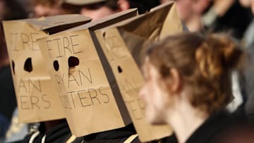 Members of the Purdue Boilermakers student section wear bags over their heads Saturday, Nov. 16, 2024, during the NCAA football game between the Purdue Boilermakers and the Penn State Nittany Lions at Ross-Ade Stadium in West Lafayette, Ind.