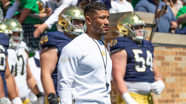 Apr 12, 2025; Notre Dame, IN, USA; Notre Dame Fighting Irish head coach Marcus Freeman waits to run onto the field during the Blue-Gold game at Notre Dame Stadium. Apr 12, 2025; Notre Dame, IN, USA; Notre Dame Fighting Irish head coach Marcus Freeman waits to run onto the field during the Blue-Gold game at Notre Dame Stadium.