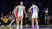 Aug 31, 2025; Los Angeles, California, USA; LA Sparks forward Dearica Hamby (5) and guard Kelsey Plum (10) celebrate against the Washington Mystics in the second half at Crypto.com Arena. Mandatory Credit: Kirby Lee-Imagn Images