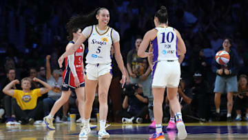 Aug 31, 2025; Los Angeles, California, USA; LA Sparks forward Dearica Hamby (5) and guard Kelsey Plum (10) celebrate against the Washington Mystics in the second half at Crypto.com Arena. Mandatory Credit: Kirby Lee-Imagn Images