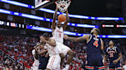 Nov 9, 2024; Houston, Texas, USA; Houston Cougars forward Joseph Tugler (11) dunks the ball during the second half against the Auburn Tigers at Toyota Center. Mandatory Credit: Troy Taormina-Imagn Images