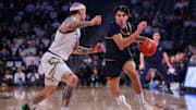 Feb 15, 2025; Atlanta, Georgia, USA; California Golden Bears guard Andrej Stojakovic (2) is defended by Georgia Tech Yellow Jackets forward Duncan Powell (31) in the first half at McCamish Pavilion. Mandatory Credit: Brett Davis-Imagn Images
