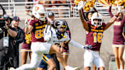 Arizona State Sun Devils Derek Eusebio (83) jumps to score a touchdown against the West Virginia Mountaineers during a game at Mountain America Stadium in Tempe on Nov. 15, 2025.