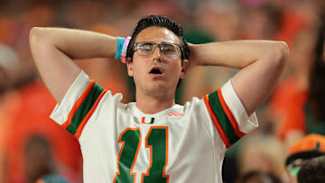 A Miami Hurricanes fan reacts against the Louisville Cardinals during the third quarter at Hard Rock Stadium. Credit: Sam Navarro-Imagn Images