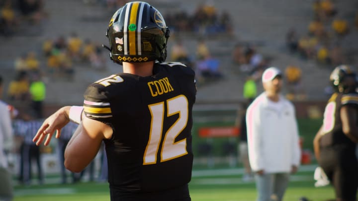 Missouri Tigers quarterback Brady Cook follows through on a pass during warm ups at Faurot Field ahead of a game against Murray State In Columbia, Mo. on Tuesday, August 13, 2024.