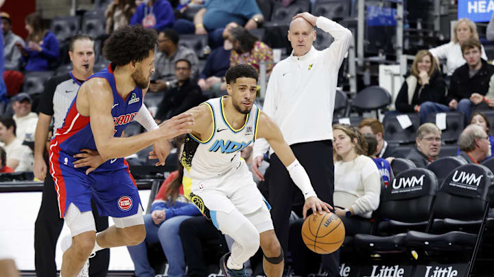 Tyrese Haliburton dribbles with Cade Cunningham in pursuit in January.