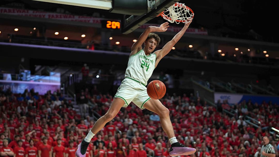 Storm Lake junior Jaidyn Coon dunks the basketball against ADM during the Iowa high school boys state basketball tournament on Monday, March 10, 2025, at Wells Fargo Arena in Des Moines. Mandatory Credit: Bryon Houlgrave-The Des Moines Register