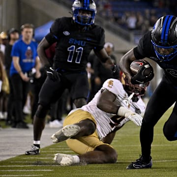 SMU wide receiver Key'Shawn Smith (9) and his Mustang teammates dominated Boston College on Saturday, besting the pre-game odds by more than 20 points.