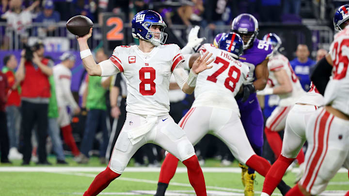 Jan 15, 2023; Minneapolis, Minnesota, USA; New York Giants quarterback Daniel Jones (8) passes the ball against the Minnesota Vikings during the third quarter of a wild card game at U.S. Bank Stadium. Mandatory Credit: Matt Krohn-Imagn Images