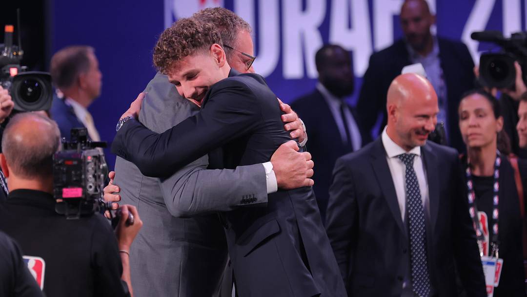 Jun 23, 2026; New York, NY, USA; The fourteenth pick in the 2026 NBA draft, Washington forward Hannes Steinbach reacts after he was selected by the Charlotte Hornets at Barclays Center. Mandatory Credit: Brad Penner-Imagn Images