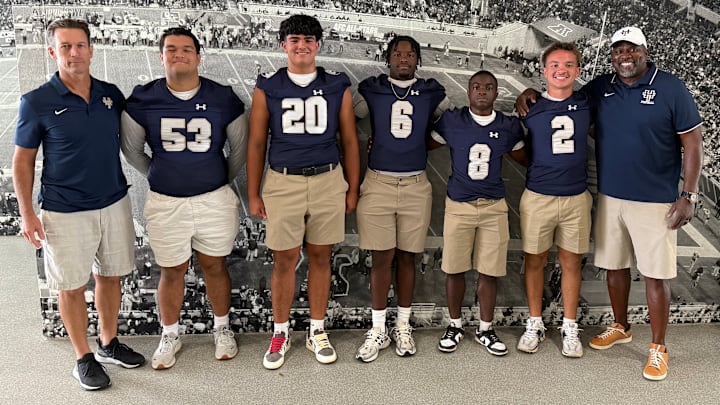 Holy Trinity Episcopal coach Hurlie Brown (far right), a former two-national champion as a player at Miami, will lead the Tigers into the Sunshine State Athletic Association this season. Holy Trinity Episcopal coach Hurlie Brown (far right), a former two-national champion as a player at Miami, will lead the Tigers into the Sunshine State Athletic Association this season.