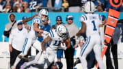 Indianapolis Colts wide receiver Michael Pittman Jr. (11) is tackled after a catch by Tennessee Titans cornerback Sean Murphy-Bunting (0) during their game at Nissan Stadium in Nashville, Tenn., Sunday, Dec. 3, 2023.