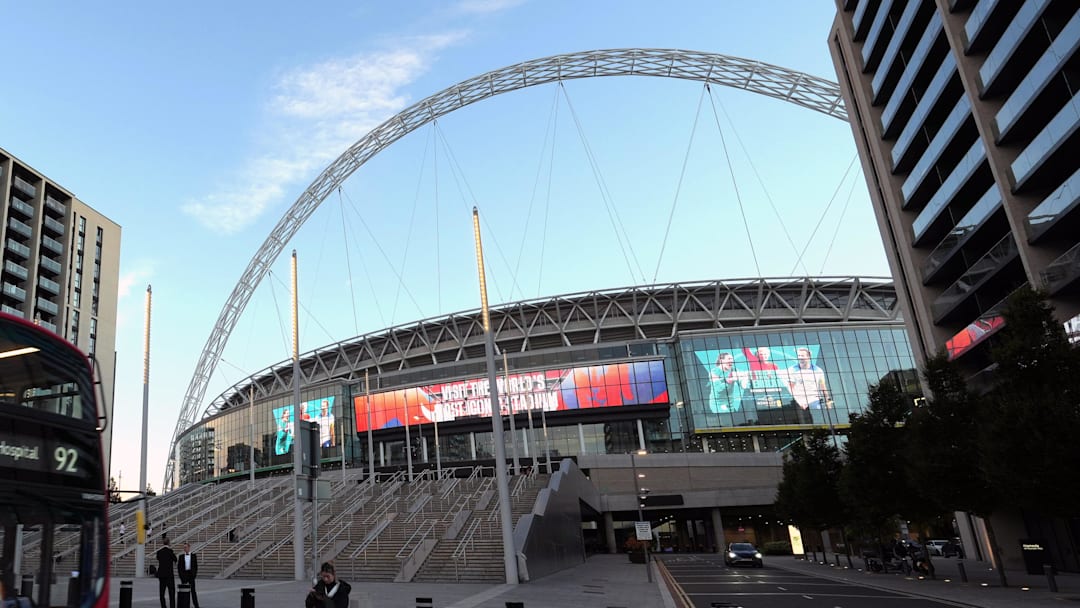 Oct 17, 2024; London, United Kingdom; A red double decker bus pass by Wembley Stadium, the site of the 2024 NFL London Games between the New England Patriots and the Jacksonville Jaguars. Mandatory Credit: Kirby Lee-Imagn Images