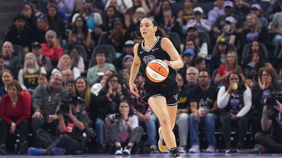 Jun 19, 2025; San Francisco, California, USA; Golden State Valkyries guard Carla Leite (0) dribbles against the Indiana Fever during the first quarter at Chase Center. Mandatory Credit: Darren Yamashita-Imagn Images