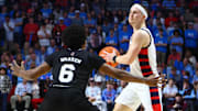 Feb 15, 2025; Oxford, Mississippi, USA; Mississippi Rebels guard Sean Pedulla (3) handles the ball as Mississippi State Bulldogs guard Dellquan Warren (6) defends during the second half at The Sandy and John Black Pavilion at Ole Miss. Mandatory Credit: Petre Thomas-Imagn Images