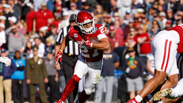 Dec 27, 2024; Fort Worth, TX, USA; Oklahoma Sooners running back Gavin Sawchuk (27) runs with the ball during the first quarter against the Navy Midshipmen at Amon G. Carter Stadium. Mandatory Credit: Andrew Dieb-Imagn Images