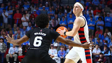 Feb 15, 2025; Oxford, Mississippi, USA; Mississippi Rebels guard Sean Pedulla (3) handles the ball as Mississippi State Bulldogs guard Dellquan Warren (6) defends during the second half at The Sandy and John Black Pavilion at Ole Miss. Mandatory Credit: Petre Thomas-Imagn Images