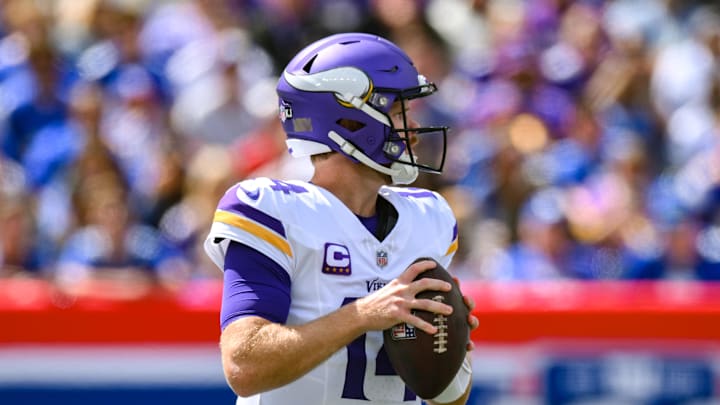 Sep 8, 2024; East Rutherford, New Jersey, USA; Minnesota Vikings quarterback Sam Darnold (14) drops back to pass against the New York Giants during the first half at MetLife Stadium. Mandatory Credit: John Jones-Imagn Images