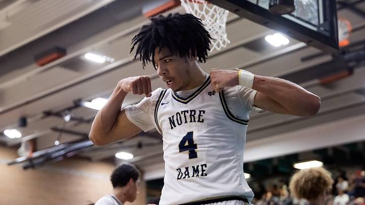 Jan 4, 2025; Gilbert, AZ, USA; Notre Dame High School (CA) forward Tyran Stokes (4) flexes as he celebrates a shot against Sandra Day O'Connor (AZ) during the Hoophall West High School Invitational at Highland High School.